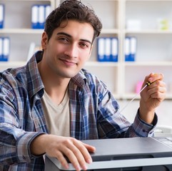 Hardware repairman repairing broken printer fax machine