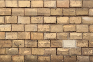 texture of an old light brick stone wall, background