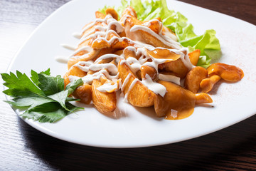 fried potatoes with honey mushrooms and herbs.