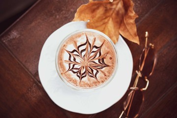 cup of hot chocolate with creamy milk