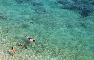 Naklejka na ściany i meble Vacanze al mare in estate - snorkeling