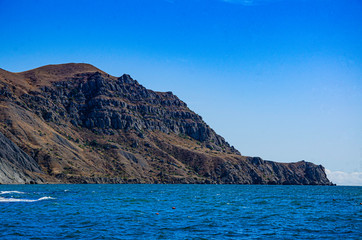 Seascape, day, sea, mountains rocky coast.