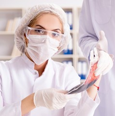 Fototapeta premium Young female woman doctor in hospital clinic lab