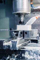 Metalworking CNC milling machine. Cutting fibreglass parts in modern processing technology.