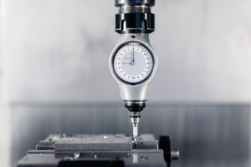 Measuring instrument placed on CNC machine in the factory.