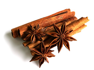 Cinnamon herbs and star anise, isolated on a white background