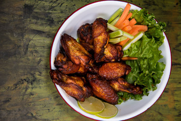 Chicken bbq wings with salad bowl