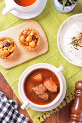 Braised beef with rice on the table