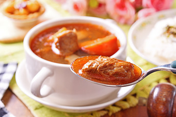 Braised beef with rice on the table