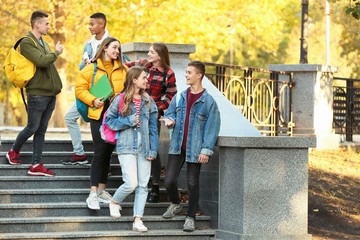 Group of teenage students outdoors