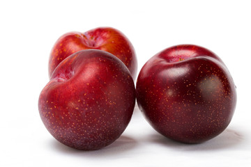  Red plum on a plate