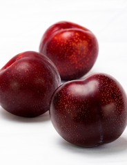 Red plum on a plate