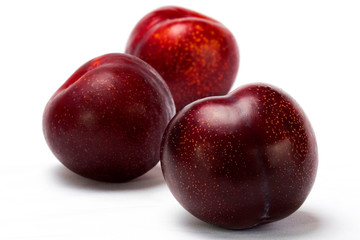  Red plum on a plate
