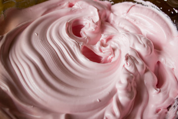 Pink cream made from egg whites. The ingredient for the cake.