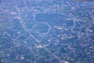 Aerial view of Bangkok Thailand and surrounding landscape, modern office buildings, condominium, living place in Bangkok city downtown in the most populated. Southeast Asia.