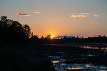 Spring sunset and river in Latvia