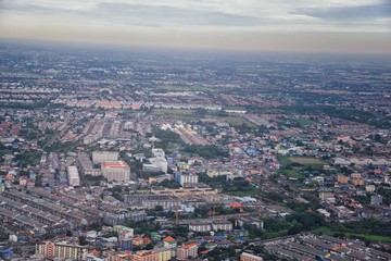 Aerial view of Bangkok Thailand and surrounding landscape, modern office buildings, condominium, living place in Bangkok city downtown in the most populated. Southeast Asia.