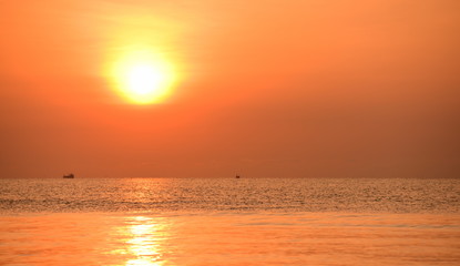 Fototapeta na wymiar The sunrise view on the beach by the sea
