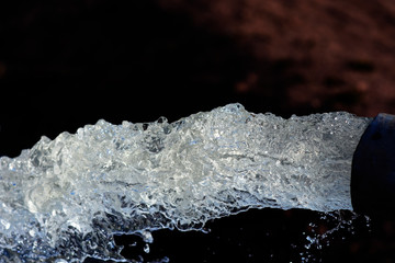water flow out from pipe by pump supply for dry season	
