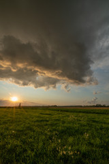 Obraz na płótnie Canvas stormy clouds at sunset time