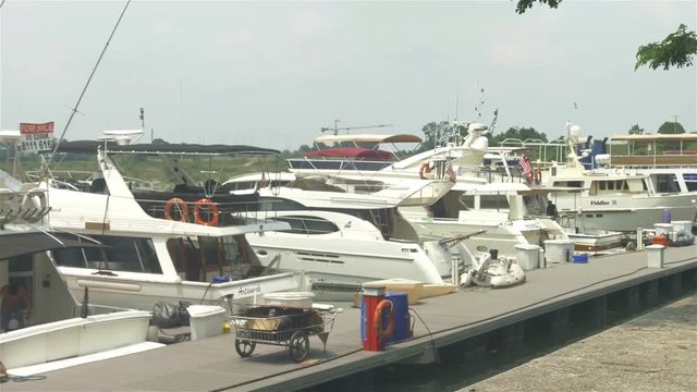 Many White Ships in Harbor With Malaysian Bendere - Hand Held.mov