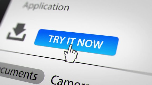 Mouse Cursor Clicking "TRY IT NOW" Button on Monitor Screen