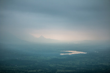 Misty valley seen from Jivdhan Fort,Maharashtra,India