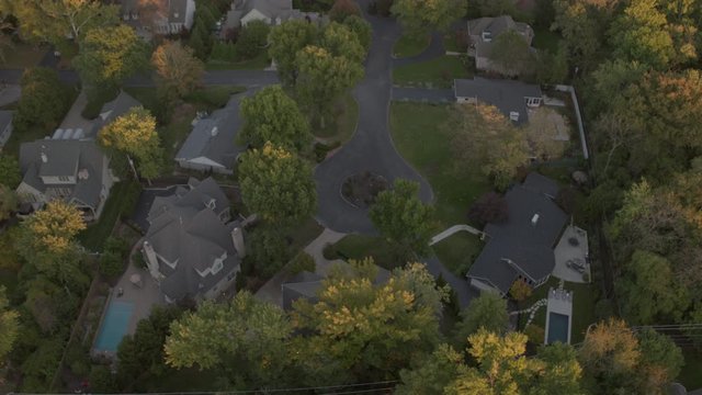 top down view of nice neighborhood in St. Louis with a tilt up to reveal the horizon