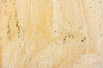 Texture of a concrete wall with cracks and scratches which can be used as a background