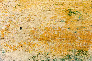 Texture of a concrete wall with cracks and scratches which can be used as a background