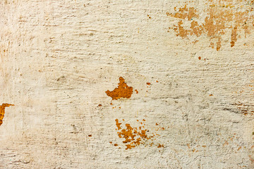 Texture of a concrete wall with cracks and scratches which can be used as a background