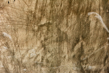 Texture of a concrete wall with cracks and scratches which can be used as a background