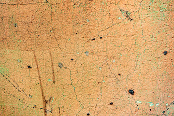 Texture of a concrete wall with cracks and scratches which can be used as a background