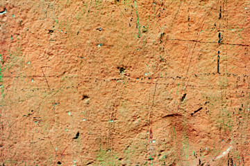 Texture of a concrete wall with cracks and scratches which can be used as a background