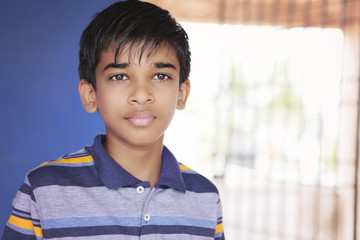 Portrait of Indian boy posing to camera © SBM Creatives