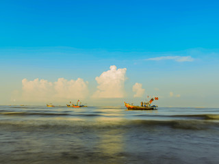 Fishing boats on the sea with blue sky  background