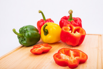 sliced bell peppers,Colorful bell peppers on wooden ,Fresh sweet  pepper 