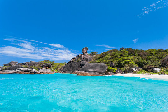 Tropical beach at Similan Islands in the Andaman Sea. Similan Island is The world's most beautiful island in Thailand. Rock that looks like a sailboat.