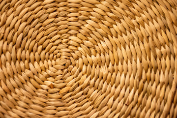 Wicker woven basket bottom texture background close up