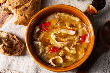 Spicy tripe soup with red paprika.