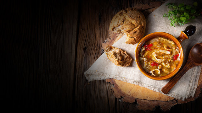 Spicy tripe soup with red paprika.