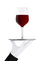 Hand with glove holds tray with red wine glass