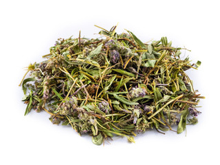 Dry thyme leaves and flowers on white background