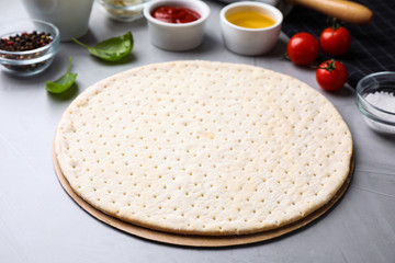Composition with fresh ingredients for pizza Margherita on light table