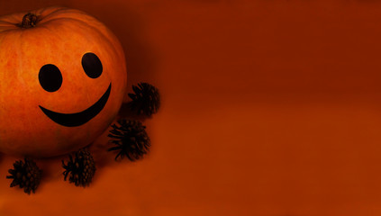 Halloween background. Copy space. Halloween pumpkin. Close-up. Smiling scary halloween pumpkin on a...
