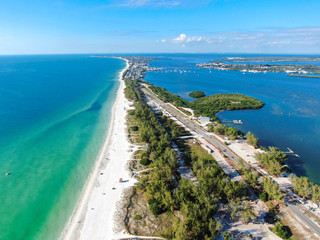 Aerial view of Anna Maria Island, white sand beaches and blue water, barrier island on Florida Gulf Coast. Manatee County. USA