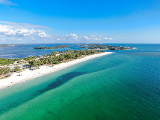 Fototapeta na wymiar Aerial view of Anna Maria Island, white sand beaches and blue water, barrier island on Florida Gulf Coast. Manatee County. USA