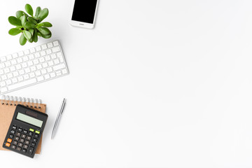 Elegant office desktop with business accessories isolated on white background with copyspace. Financial concept