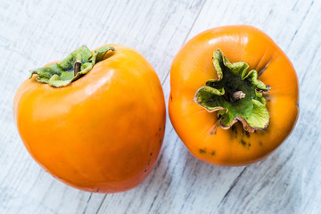 Fresh Ripe Persimmon Fruits Ready to Eat.