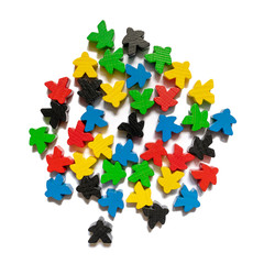 colorful meeples  on gray background. Small figures of man. Board games. Happiness and fun time passing. .